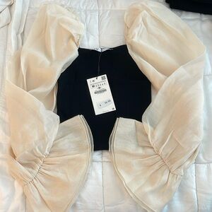 Beautiful Knit Top with contrast sleeves